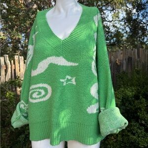 Vibrant Green V-Neck Sweater with White Patterns